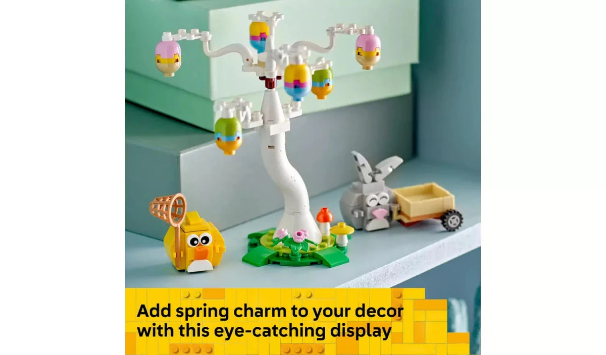 White egg-crane build with colorful egg parts, bunny and chick figures on display base