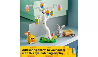 White egg-crane build with colorful egg parts, bunny and chick figures on display base