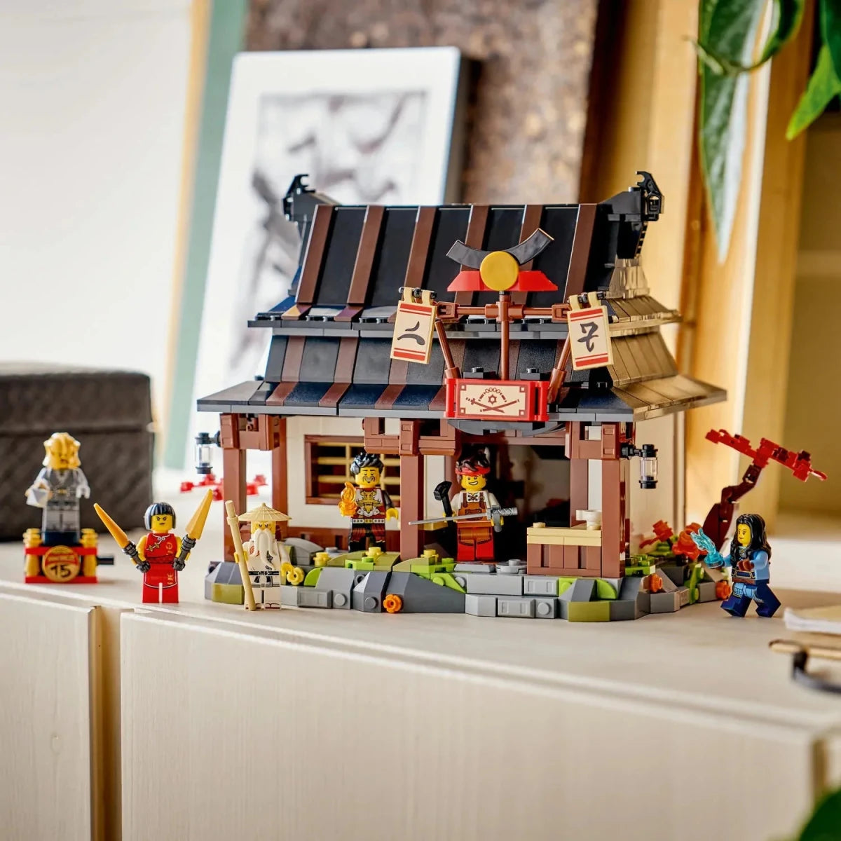 LEGO NINJAGO Four Weapons Blacksmith 15th Anniversary model on a display surface