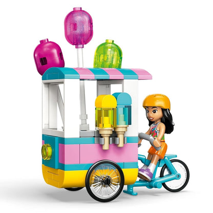 Ice cream cart with balloon canopy, pink and teal blocks; girl mini figure