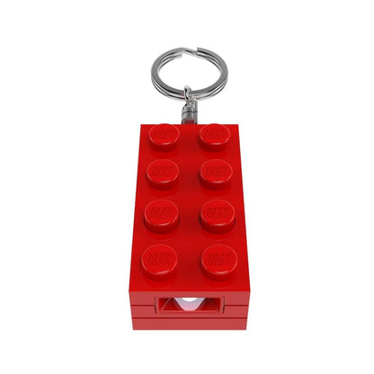 Red LEGO 2x4 keychain light with stud front and small light window