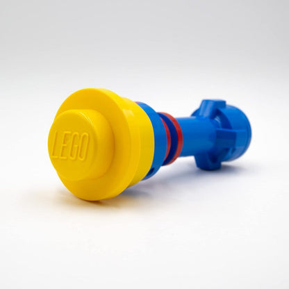 Torch flashlight with yellow front cap, blue handle, and red ring detail