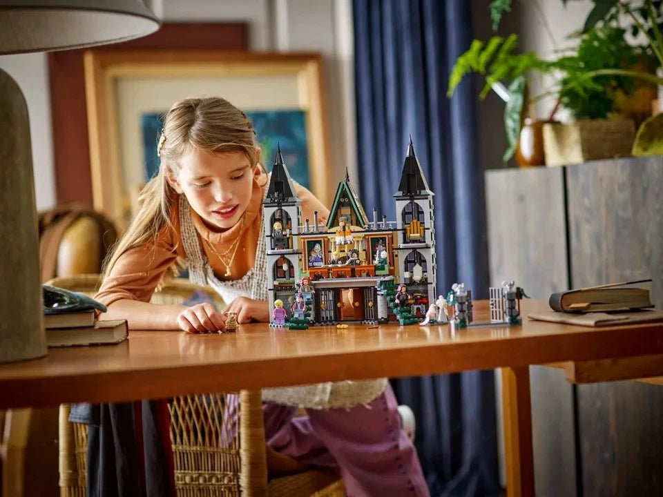 Malfoy Manor miniature castle model on tabletop with multiple tower spires