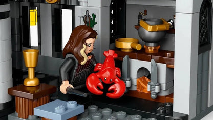 Malfoy Manor interior room with red devil-like creature figure and minifigure at desk