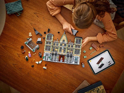 Malfoy Manor LEGO castle build on table with minifigures and loose accessory pieces