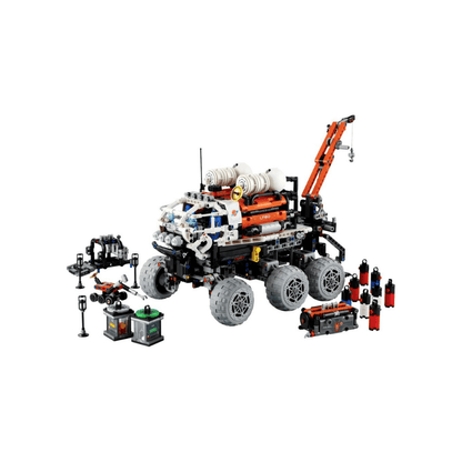 Mars Crew Exploration Rover model with orange lift arm, gray wheels, and accessory parts