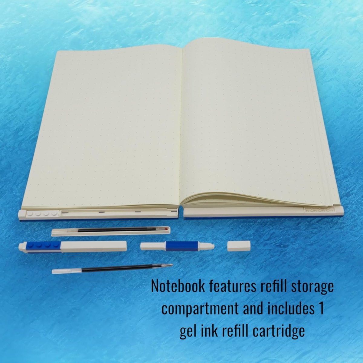 Open notebook with gel pen refills and refill storage pieces