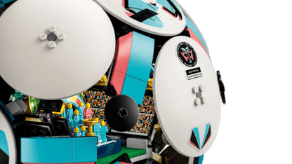 LEGO soccer ball toy side with white panel, logo sticker, and black hinge