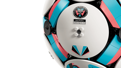 Close-up of LEGO soccer ball toy outer disc with size label and studs