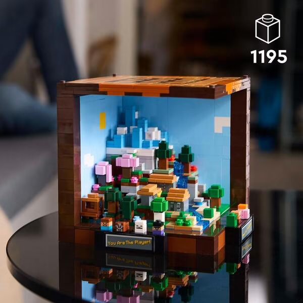 LEGO Minecraft crafting table display with colorful block scene inside frame