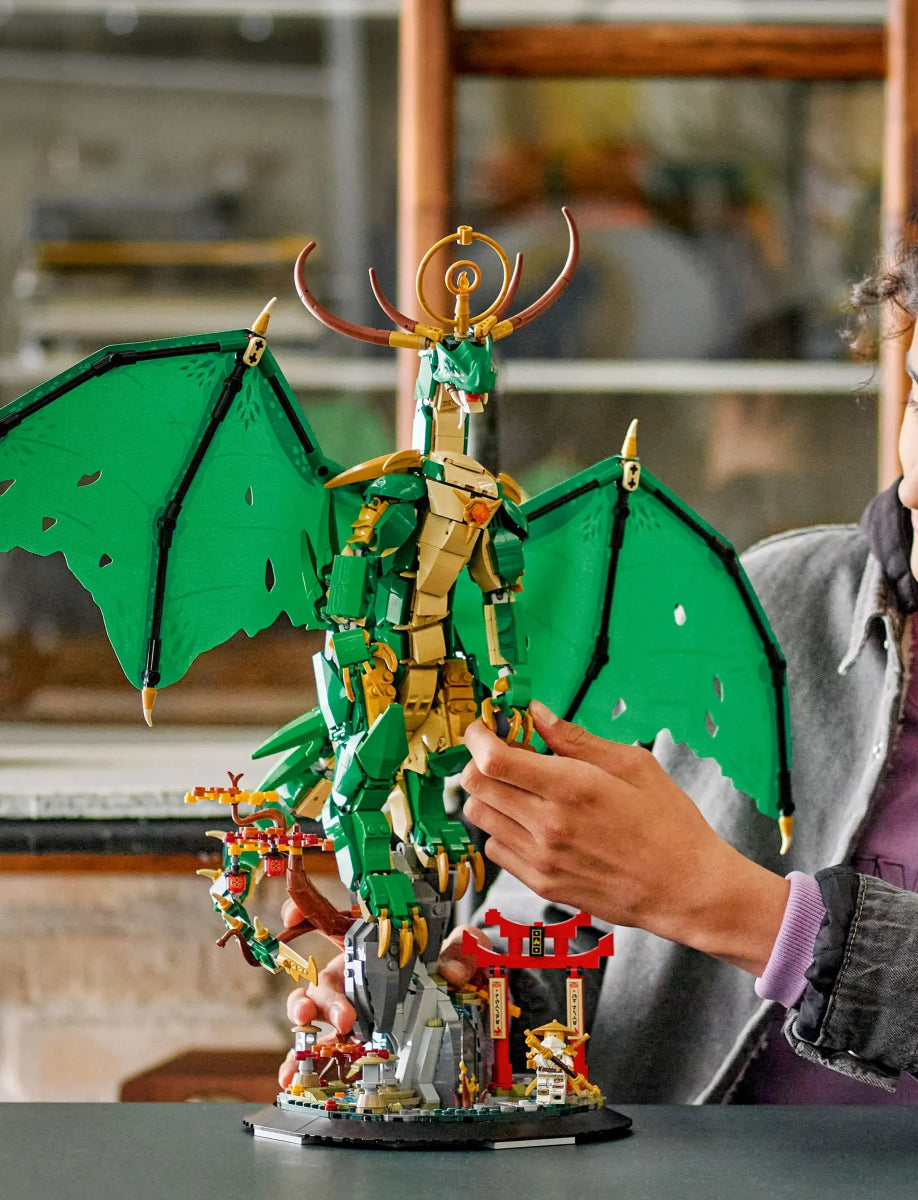 Green Guardian Dragon figure with horned crown and large wings on display base