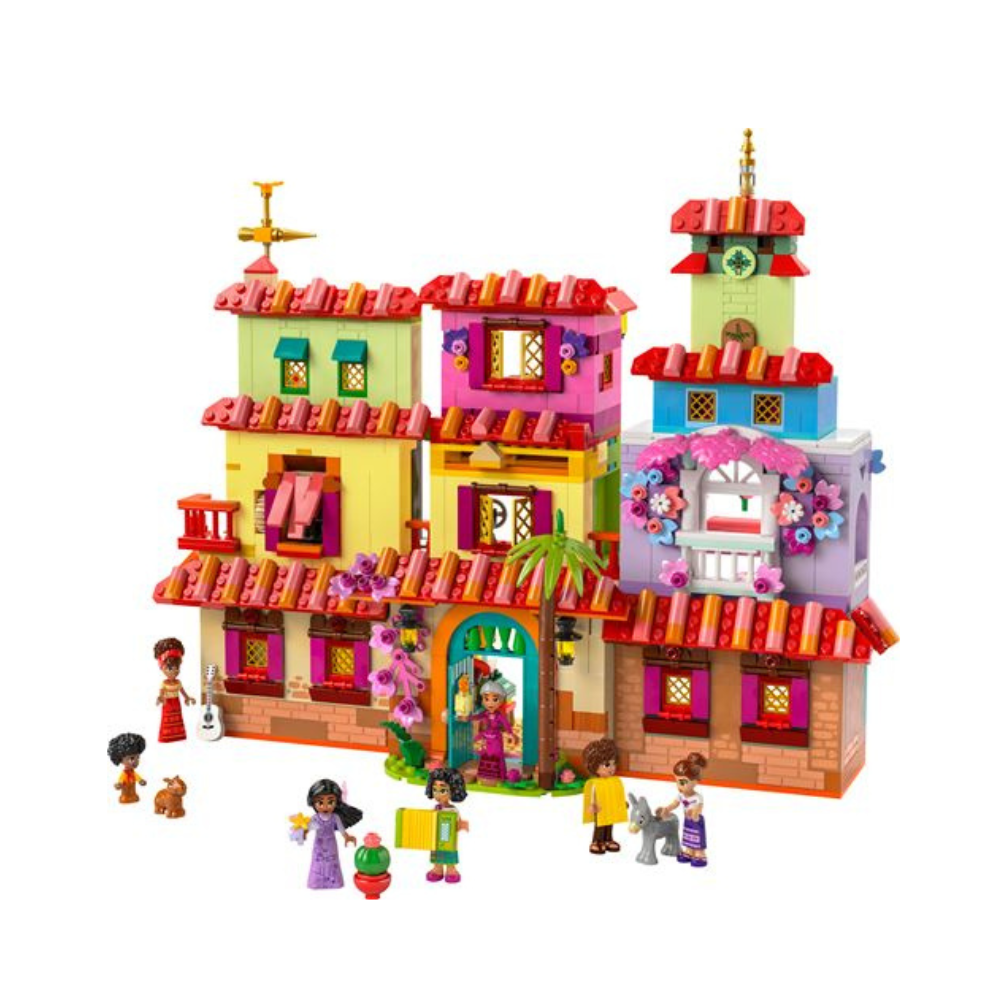Multicolored LEGO house model with red roof, flower arch, two towers, and minifigures