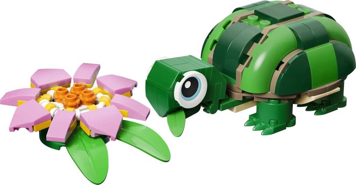 Green LEGO turtle build with big eye and pink water-lily flower
