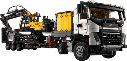 Volvo FMX Bagger-LKW Modell seitlich: gelbe Hydraulikmodule, Frontachse und Räder