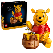 LEGO Winnie the Pooh boxed set with honey pot figure holding a honey dipper