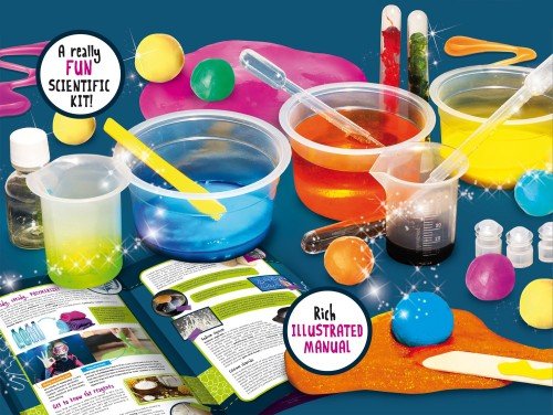 Assorted science experiment supplies with colorful liquid samples, beakers, droppers, manual