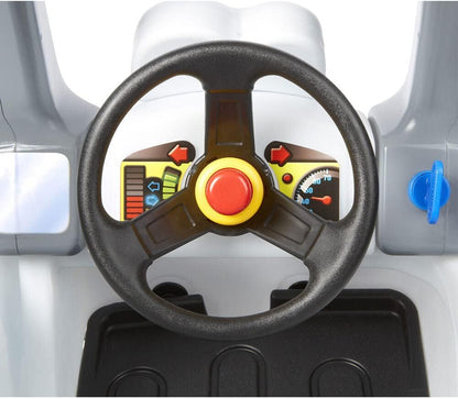 Ride-on steering wheel with large red button and dashboard speed gauges