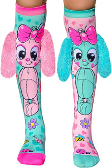 Knee-high bunny themed socks with teal and pink cartoon bunny faces and striped cuffs.