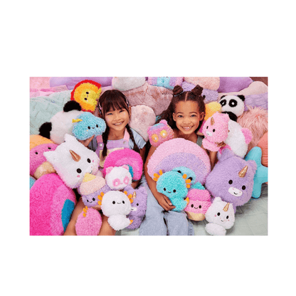 Children surrounded by assorted pastel fluffy plush toys in different animal shapes