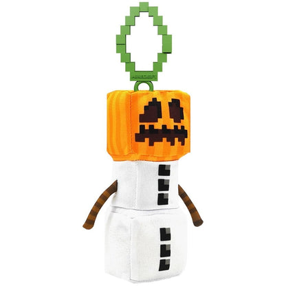 Clip-on Plüsch: orange-schwarze Pixelmaske über weißem Körper, an grüner Öse