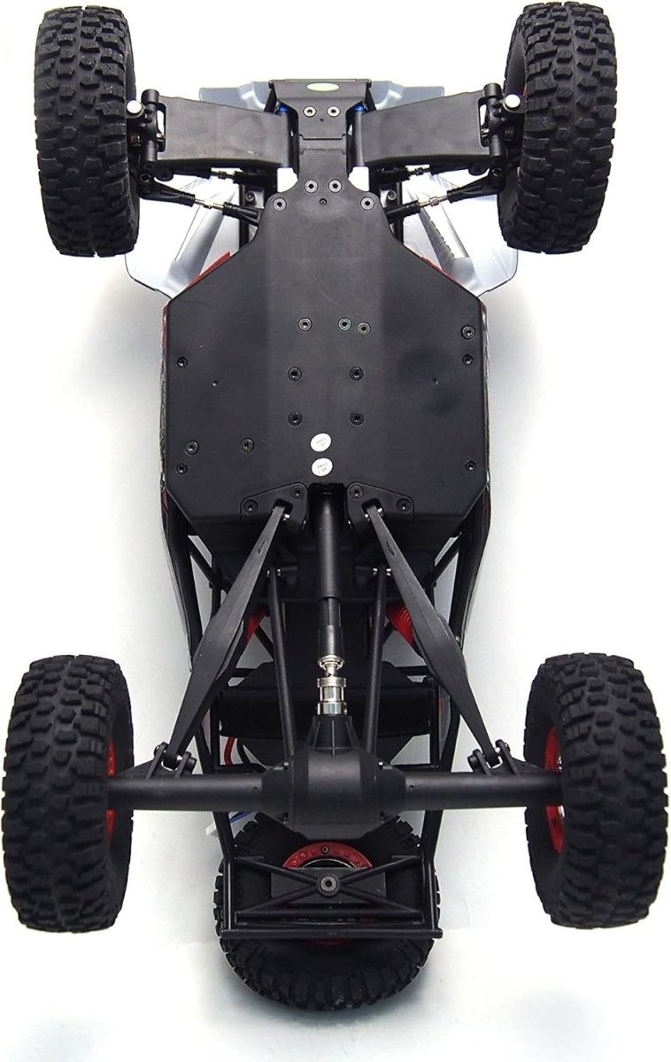 RC buggy chassis front view with four tires and metal suspension arms
