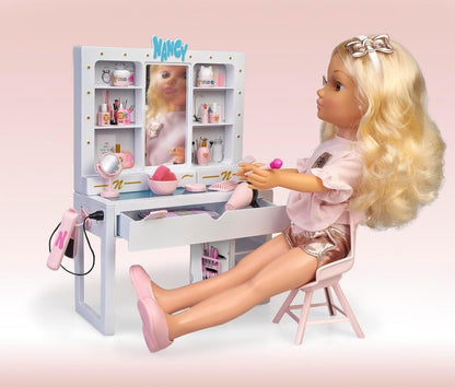 Beauty doll seated at vanity station with mirror, tools and hair dryer accessory