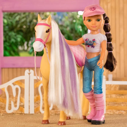 Doll holding light tan horse with long mane and pink bridle; white flower top