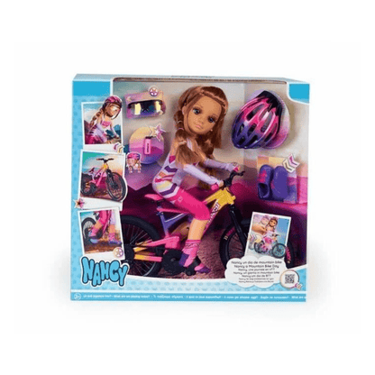 Boxed mountain bike doll with pink-and-purple riding outfit and helmet