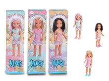 Fashion Doll: three boxed dolls and two standing dolls in pastel dresses