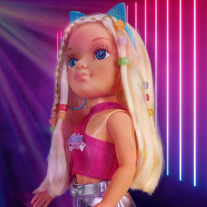 Blonde doll close-up with long hair, pink top, and colorful hair streaks