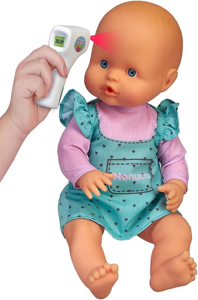 Baby doll with teal heart romper as thermometer reads 36.5°C near forehead