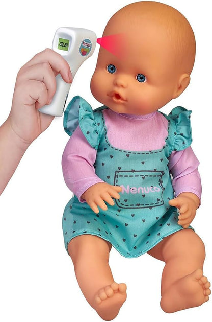 Baby doll with teal heart romper as thermometer reads 36.5°C near forehead