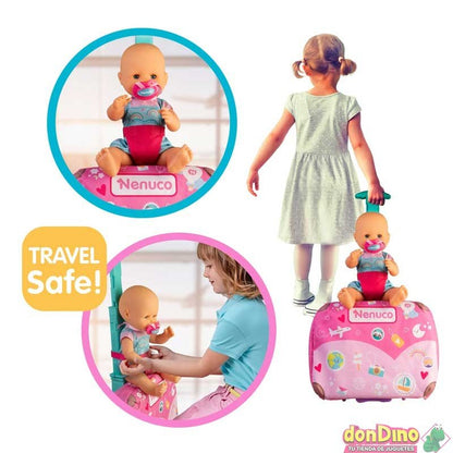 Baby doll in blue outfit with pink travel suitcase; travel-safe play accessories