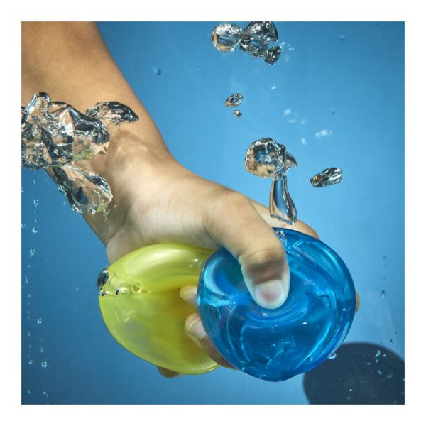 Hydro balls underwater: blue and yellow-green balls with water splashes