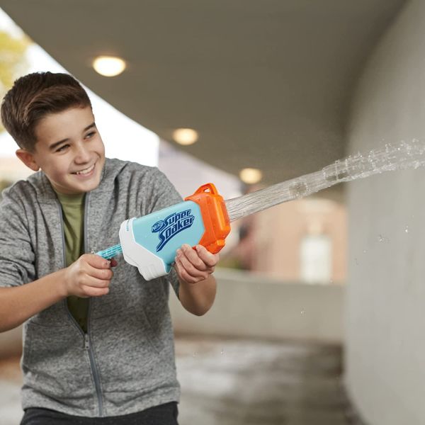 NERF Super Soaker Torrent water blaster spraying a stream of water