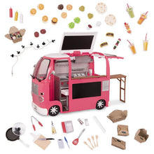 Pink toy food truck playset with open grill area, side table, and miniature food accessories