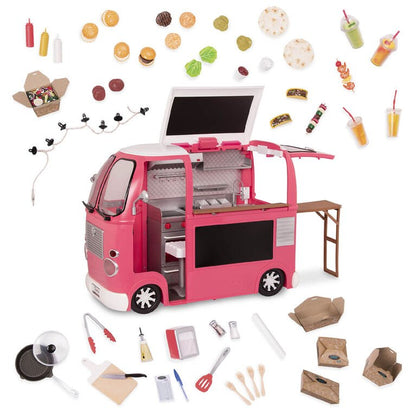 Pink toy food truck playset with open grill area, side table, and miniature food accessories