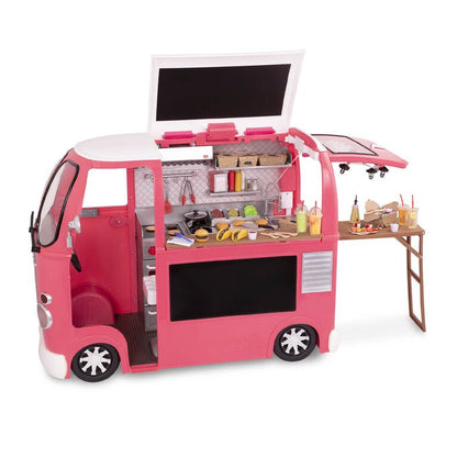 Pink toy food truck playset with open kitchen bay, side table, and assorted food pieces