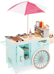 Toy hot dog cart with pink-and-white umbrella and condiment bottles