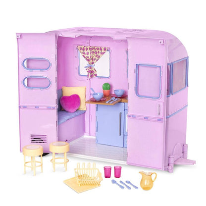 Playset camper trailer with open door, kitchen counter, sink, stove, and window blinds