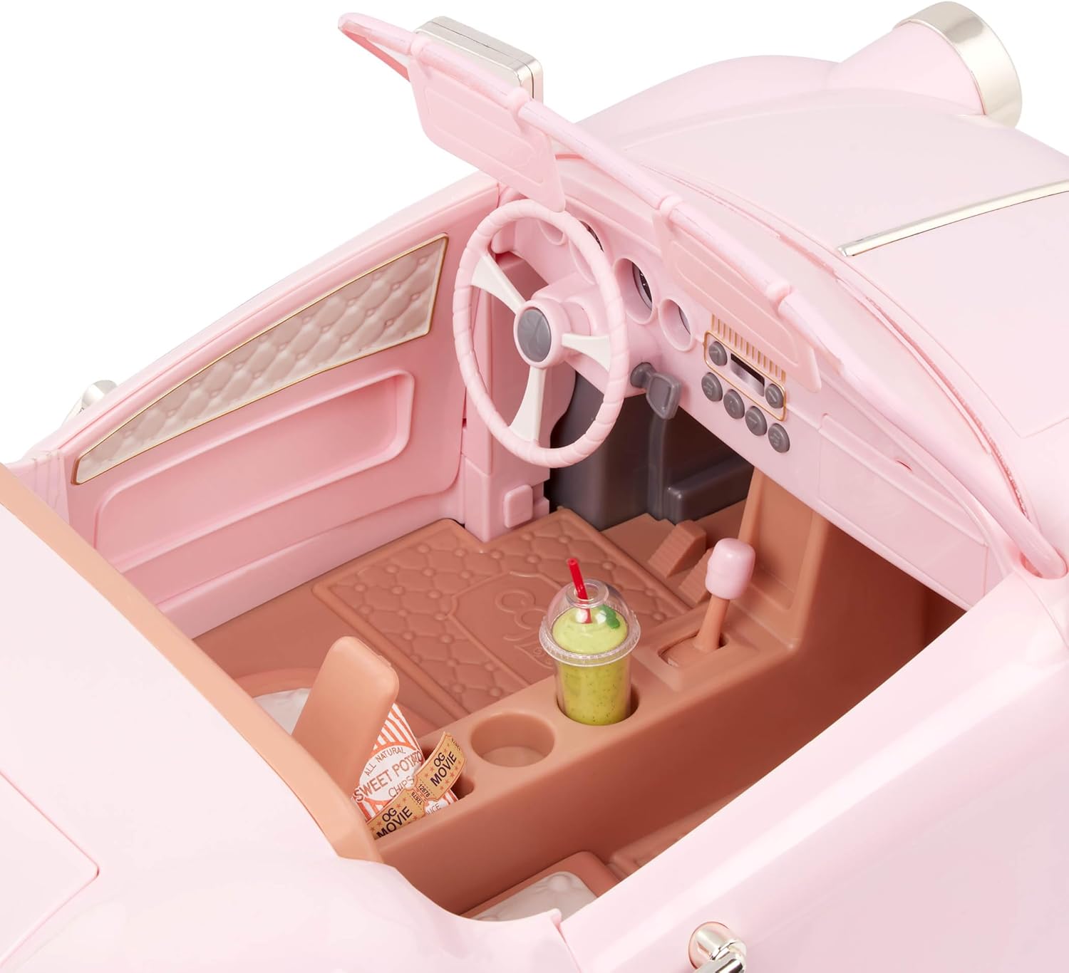 Pink convertible toy car interior with steering wheel, dashboard buttons, and seats.