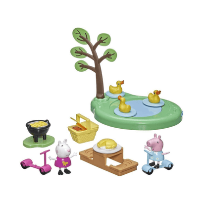 Picnic playset pieces: picnic table with tree, ducks, Peppa figure, accessories