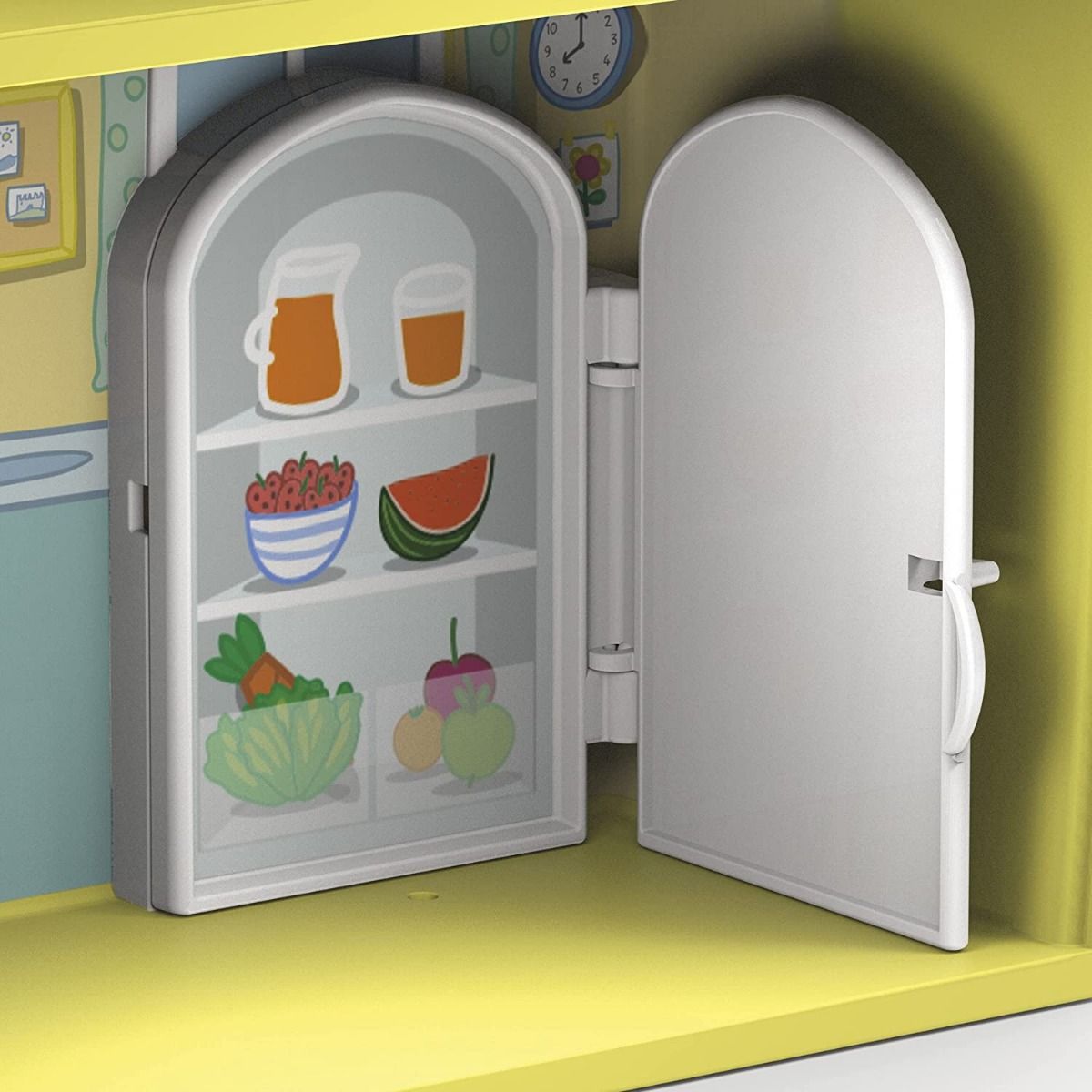 Toy refrigerator with open door and shelves holding food accessories