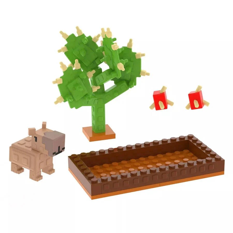Build set: green tree with a small animal and fenced brown garden bed