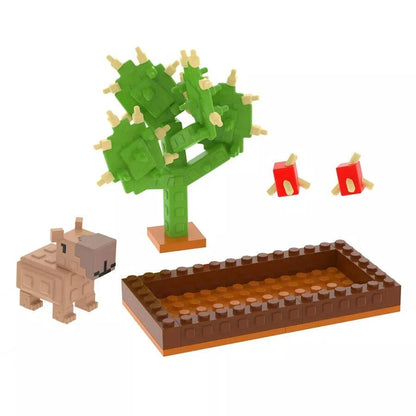 Build set: green tree with a small animal and fenced brown garden bed