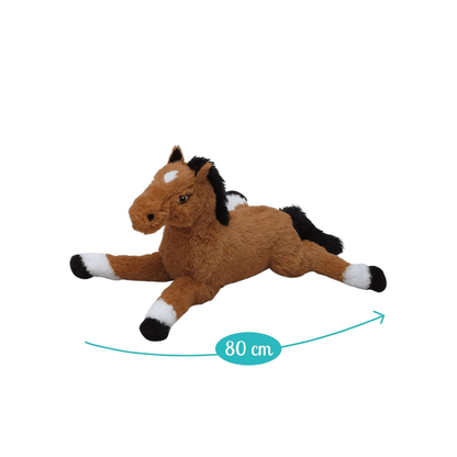 Giant plush horse lying on its side, tan fur with black mane and white accents, cute face.