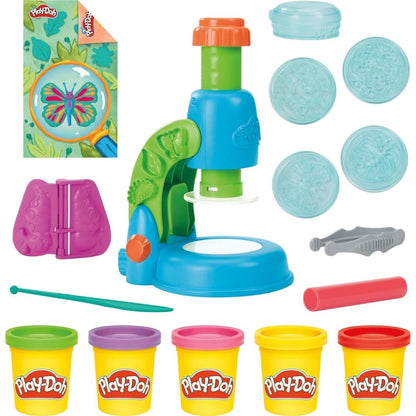 Light and Look Scope toy with blue base, green parts, Play-Doh jars and tools