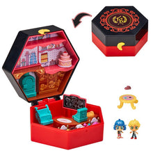 Hexagonal bakery playset box with open compartments, cake pieces, and two character figures