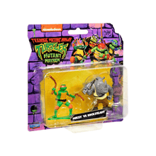 Mike vs Rocksteady mini figure set: green turtle figure and gray rock creature in blister