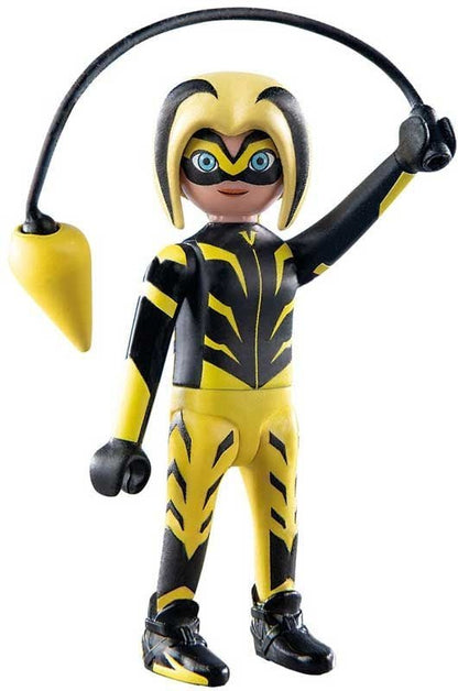 Yellow-and-black masked hero figure with twin pigtails, holding yellow megaphone accessory